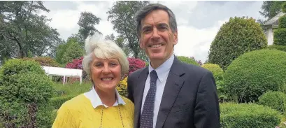  ??  ?? ●● Pat McMillan with Macclesfie­ld MP David Rutley