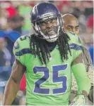  ??  ?? Seahawks cornerback Richard Sherman ruptured his Achilles on Thursday against the Cardinals, coach Pete Carroll said.
| AP