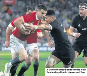  ??  ?? &gt; Conor Murray heads for the New Zealand try line in the second Test
