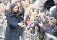  ??  ?? Meghan Markle greets the crowds
