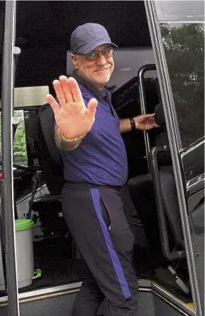  ??  ?? Crucial mission: Eduardo Vingada boarding a bus in Subang on Thursday prior to their departure for the Asian Cup qualifier against Hong Kong. Left: Mohd Shahrom Kalam.