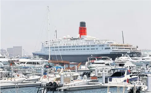  ?? REUTERS ?? The Queen Elizabeth II luxury cruise liner sits at its permanent mooring at Port Rashid in Dubai on Wednesday.