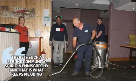  ??  ?? Dianne Rigley (manager), Biju (owner) and staff from Whelan Cleaning cleaning up The Holy Grail following the flash flood on Tuesday evening.