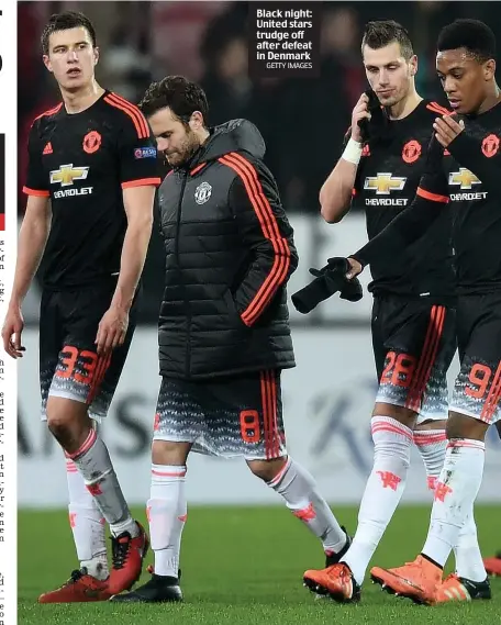  ?? GETTY IMAGES ?? Black night: United stars trudge off after defeat in Denmark