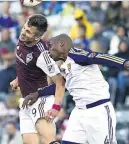  ??  ?? HEADACHES: Doyle (left) in MLS action