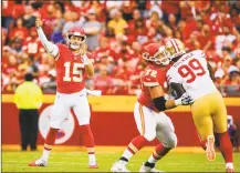  ?? Getty Images ?? Patrick Mahomes of the Kansas City Chiefs throws a touchdown pass in the first quarter of a preseason game against the San Francisco 49ers in August.