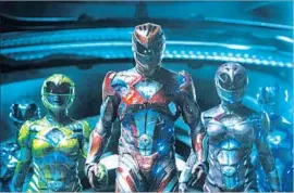  ?? Lionsgate ?? “SABAN’S POWER RANGERS” rekindles memories of wasted childhood hours.