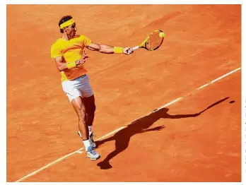  ?? — Reuters ?? Back to you: Spain’s Rafael Nadal returning a shot to Bosnia’s Damir Dzumhur during the second round of the Italian Open on Wednesday.