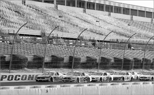  ?? MATT SLOCUM/AP ?? Pocono Raceway in Long Pond, Pennsylvan­ia held an unpreceden­ted triplehead­er Sunday. All totaled, there were four NASCAR races, including two in the Cup Series, over the weekend.