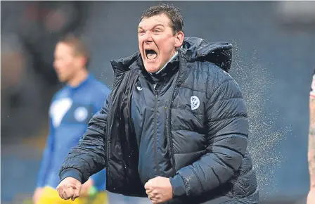  ??  ?? Tommy Wright’s celebratio­ns were a little over-zealous but Dundee gaffer Neil McCann should’ve kept his cool.