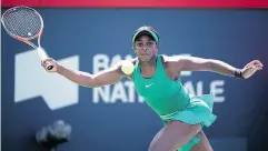  ?? PAUL CHIASSON / THE CANADIAN PRESS ?? Sloane Stephens of the United States returns to Carla Suarez Navarro of Spain Thursday in Montreal.