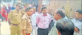  ?? HT ?? DM Ravi Ranjan and SSP Ashish Tiwari visiting glass factories in Firozabad on Wednesday.