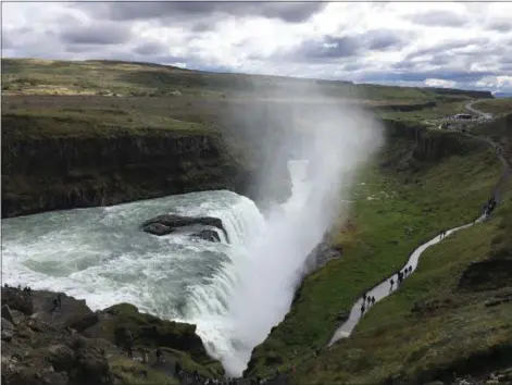  ?? KEVIN MARTIN—THE MORNING JOURNAL ?? Gullfoss, (“Golden Waterfall”) in the Golden Circle of southwest Iceland is one of the country’s most popular attraction­s.