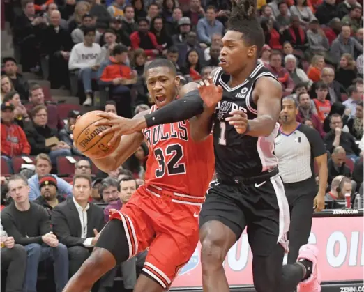  ?? DAVID BANKS/ AP ?? Guard Kris Dunn, who agreed to a contract with the Atlanta Hawks on Saturday, averaged 10.7 points and 5.1 assists in 149 games with the Bulls.