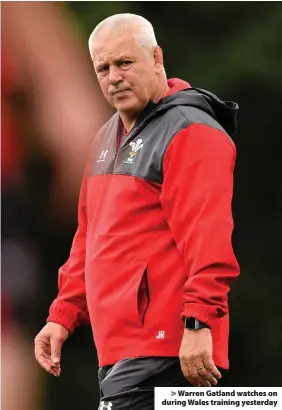  ??  ?? > Warren Gatland watches on during Wales training yesterday