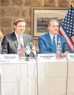  ?? GOVERNOR'S OFFICE ?? A year ago this week, Gov. Ron DeSantis and Jimmy Patronis were all smiles.