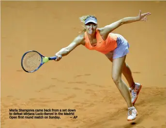  ?? — AP ?? Maria Sharapova came back from a set down to defeat Mirjana Lucic-Baroni in the Madrid Open first round match on Sunday.