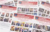  ?? JON ELSWICK/AP ?? The FBI uses flyers to gather tips and track down suspects. More than 700 people have been charged so far.