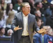  ??  ?? Michigan State coach Tom Izzo improved to 3-12 against Duke with the Spartans’ 7569 win Tuesday.