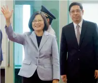  ?? AP ?? President Tsai Ing-wen waves before departing for Latin America visit at Taoyuan Internatio­nal Airport in Taoyuan, Taiwan. —