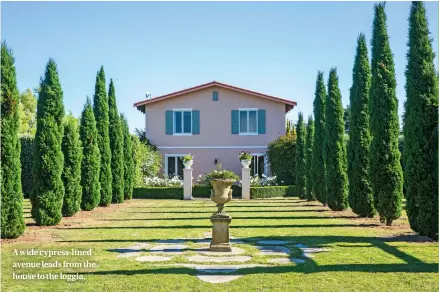  ??  ?? A wide cypress-lined avenue leads from the house to the loggia.