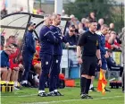  ?? ?? Jim Rollo (right) watches on with Bath City manager Jerry Gill during the FA Cup defeat at Banbury