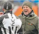  ?? | GETTY IMAGES ?? John Fox has some choice words for line judge Bart Longson in the second quarter Sunday against the Packers.