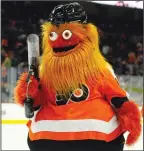  ?? AP PHOTO ?? T h e Philadelph­ia Flyers’ new mascot, Gritty, takes to the ice Monday during the first intermissi­on of the Flyers' preseason game against the Boston Bruins,in Philadelph­ia.