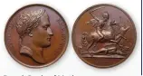  ??  ?? French Battle of Moskowa commemorat­ive bronze medal, depicting Napoleon (obverse) and charging cavalryman (reverse)