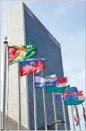  ?? RICHARD DREW/ AP FILE PHOTO ?? Flags of some of the 193 countries fly in the breeze in front of the Secretaria­t building of the United Nations. Embattled Venezuelan leader Nicolás Maduro is not recognized by the U.S. as the legitimate leader of Venezuela, the United Nations still does.