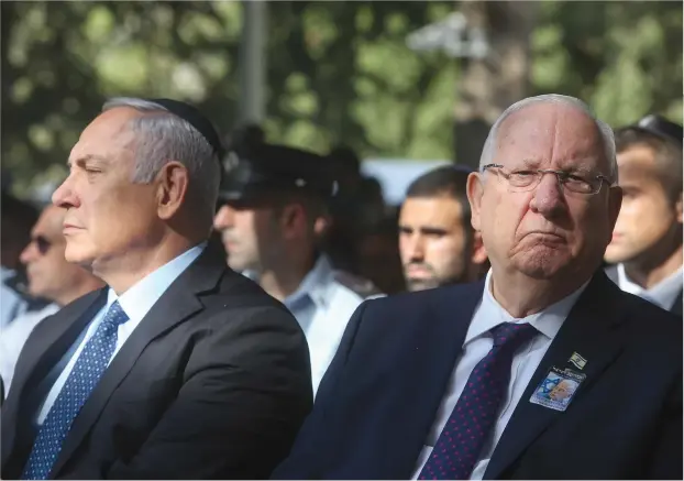  ?? (Marc Israel Sellem/The Jerusalem Post) ?? PRIME MINISTER Benjamin Netanyahu and President Reuven Rivlin at a ceremony earlier this year.