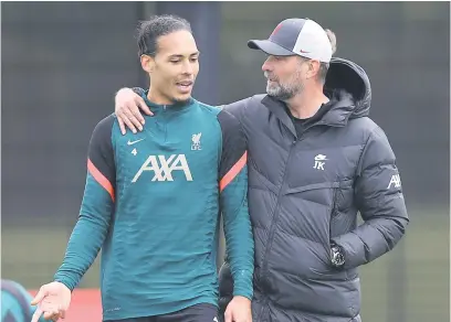  ?? Picture: Getty Images ?? RESPECT. Liverpool captain Virgil van Dijk (left) says it will be tough to replace manager Juergen Klopp at the end of the season.