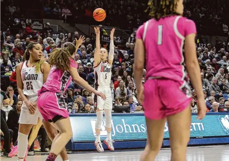  ?? Christian Abraham/Hearst Connecticu­t Media ?? UConn’s Paige Bueckers releases a shot against Georgetown at Gampel Pavilion on Friday.