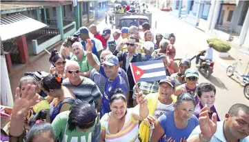  ??  ?? People are transporte­d to greet the caravan carrying the ashes of Fidel Castro in Colon, Cuba. — Reuters photo