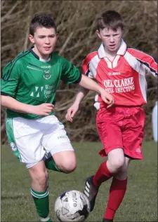  ??  ?? Eoin Doyle of Forth Celtic tries to break away from Ciarán Scott.