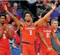  ?? BRANDON DILL/THE ASSOCIATED PRESS ?? Clemson’s Dillon Hunter celebrates his team’s 72-64 win against Baylor on Sunday in a second-round NCAA Tournament game in Memphis, Tenn.