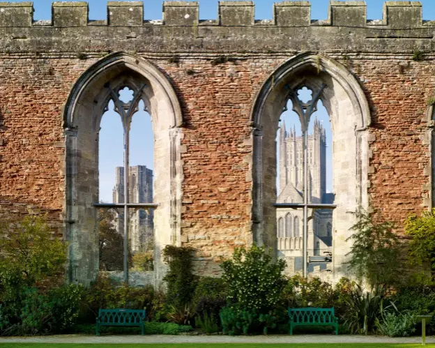  ?? ?? Fig 4: The hall of Wells, Somerset, built by Bishop Burnell in the 1280s. As was typical by this date, the upper parts of the windows were glazed and the lower sections barred. Both levels could be sealed with shutters. The hall interior once possessed an encaustic tile floor and arcades. The idea of adding a battlement­ed parapet—rather than gables—to a non-defensive building proved hugely influentia­l