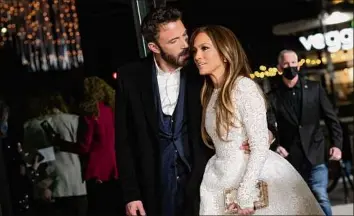  ?? Valerie Macon / AFP / TNS ?? Jennifer Lopez and Ben Affleck arrive for a special screening of “Marry Me” at the Directors Guild of America on Feb. 8 in Los Angeles.