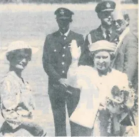  ?? ?? Taupō District Mayor Joan Williamson (left) escorts Queen Elizabeth II during a visit to Taupō in 1990.