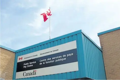  ?? THE CANADIAN PRESS FILES ?? The Public Service Pay Centre is shown in Miramichi, N. B., in, 2016. Federal government workers who’ve been overpaid through the troubled Phoenix pay system are voicing frustratio­ns with a plan to report the overpaymen­ts in order to avoid costly tax...