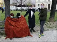  ?? DARKO BANDIC — THE ASSOCIATED PRESS ?? People rest in park after an earthquake March 22in Zagreb.