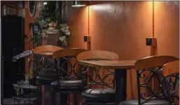  ?? MEDIANEWS GROUP ?? Tables inside Bella Vita Café