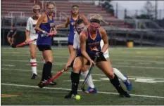  ?? BILL RUDICK — FOR DIGITAL FIRST MEDIA ?? Downingtow­n West’s Anny Miller moves with the ball in front of Conestoga’s Caroline O’Brien Tuesday night.