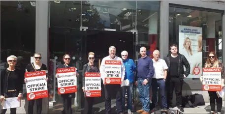  ??  ?? Councillor Declan Bree joined with workers at Tohers, O’Connell Street during their work stoppage on Friday.