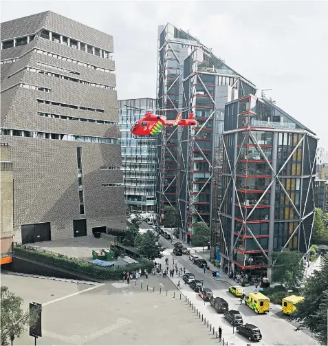  ??  ?? An air ambulance lands at the Tate Modern after Bravery, left, threw the boy off the viewing platform. The autistic teenager appeared in court by video link, right, from Broadmoor