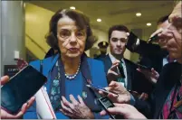  ?? MANUEL BALCE CENETA — THE ASSOCIATED PRESS FILE ?? Sen. Dianne Feinstein, D-Calif., speaks to reporters at the Capitol in Washington on Jan. 28. Feinstein, 87, says she hasn’t thought about retiring before her term ends in 2024.