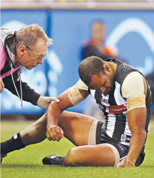  ?? Picture: GETTY IMAGES ?? Travis Varcoe after dislocatin­g his elbow and being knocked out.