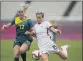  ?? FERNANDO VERGARA — AP ?? Team USA’s Megan Rapinoe, right, and Australia’s Ellie Carpenter battle for the ball in Kashima, Japan.