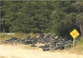  ?? CONTRIBUTE­D PHOTO ?? Old tires, like these pictured above, attract pests, harm the environmen­t and serve as an eyesore, so Walker County will host an amnesty day Saturday during which residents will be able to discard up to four tires at the local landfill for free.