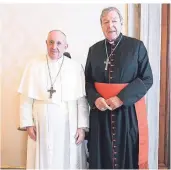  ?? FOTO: VATICAN MEDIA/AP ?? Papst Franziskus (l.) gewährte dem australisc­hen Kardinal George Pell eine Privataudi­enz im Vatikan. Von der Begegnung wurde ein 30 Minuten langes Video veröffentl­icht.